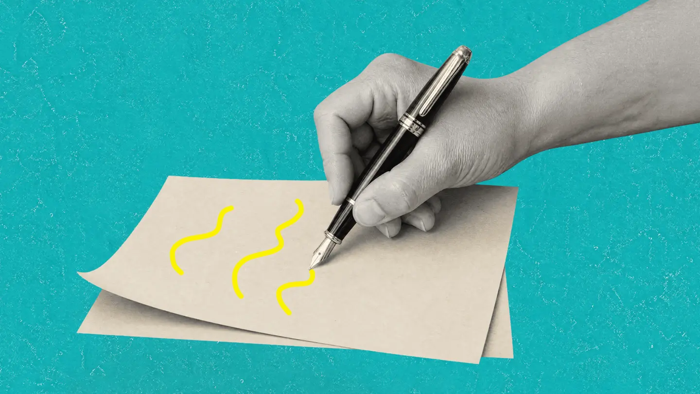 A hand holding a fountain pen drawing squiggles on a sheet of paper, on a teal background